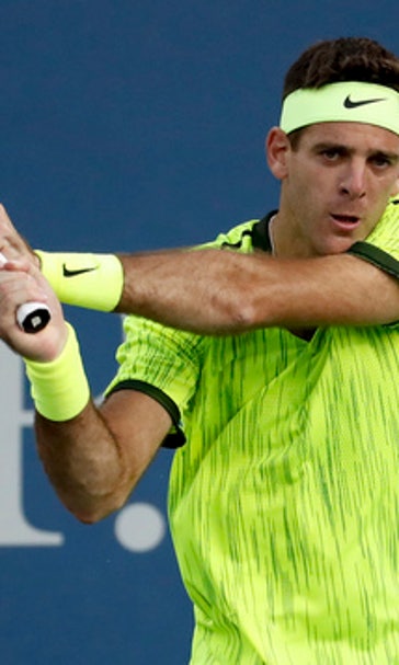 The Latest: Rain suspends play on US Open outer courts